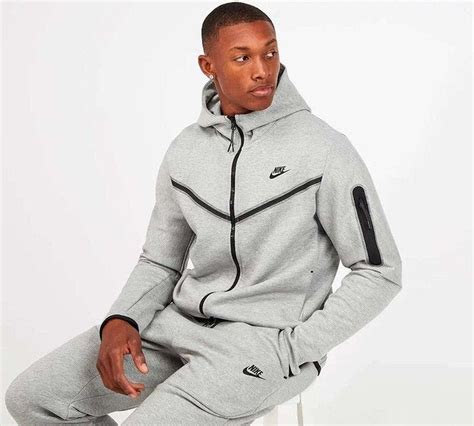 gray Nike tech suit